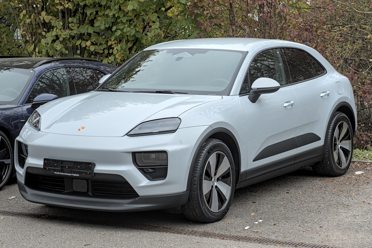 Front side view with aerodynamic wheels and sleek LED headlights