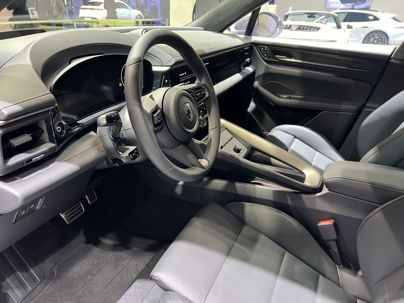 Digital dashboard and multifunction steering wheel in luxury electric SUV interior