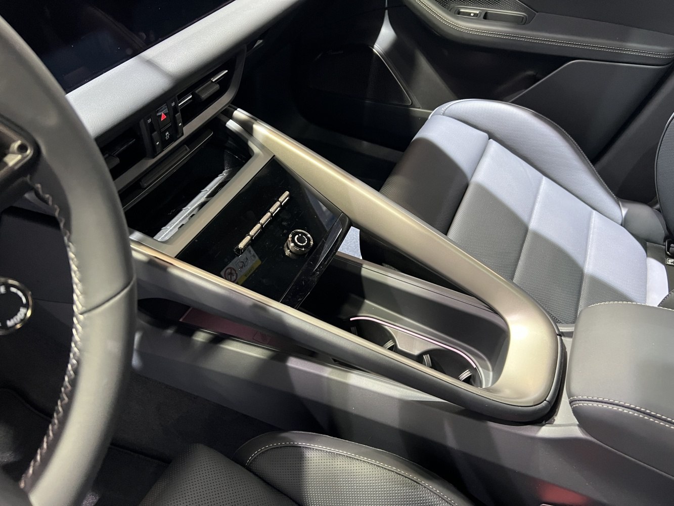Modern center console with control buttons and ergonomic design