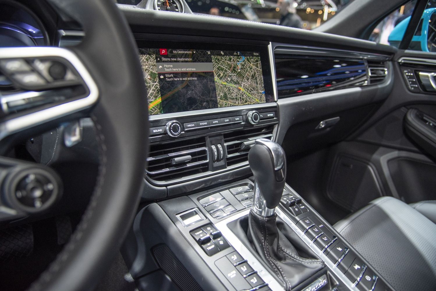 Interior dashboard with navigation screen and gear shifter
