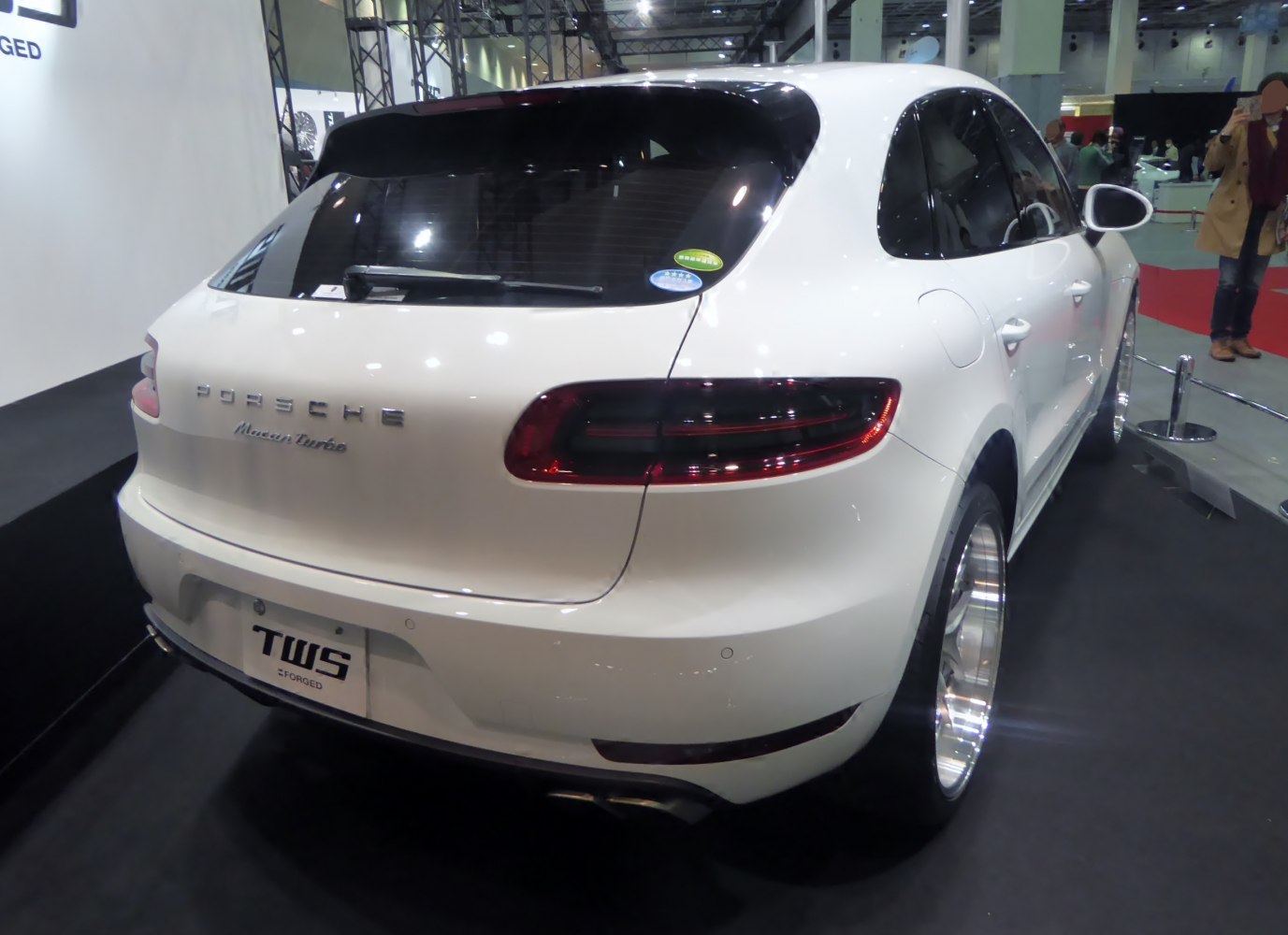 Rear view with turbo badge and large custom alloy wheels