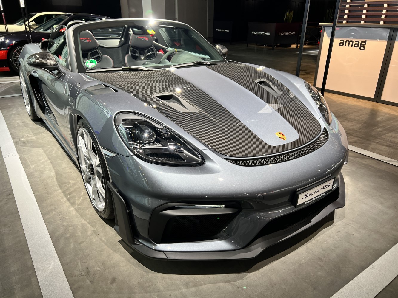 Carbon fiber hood and aerodynamic body on a sports convertible