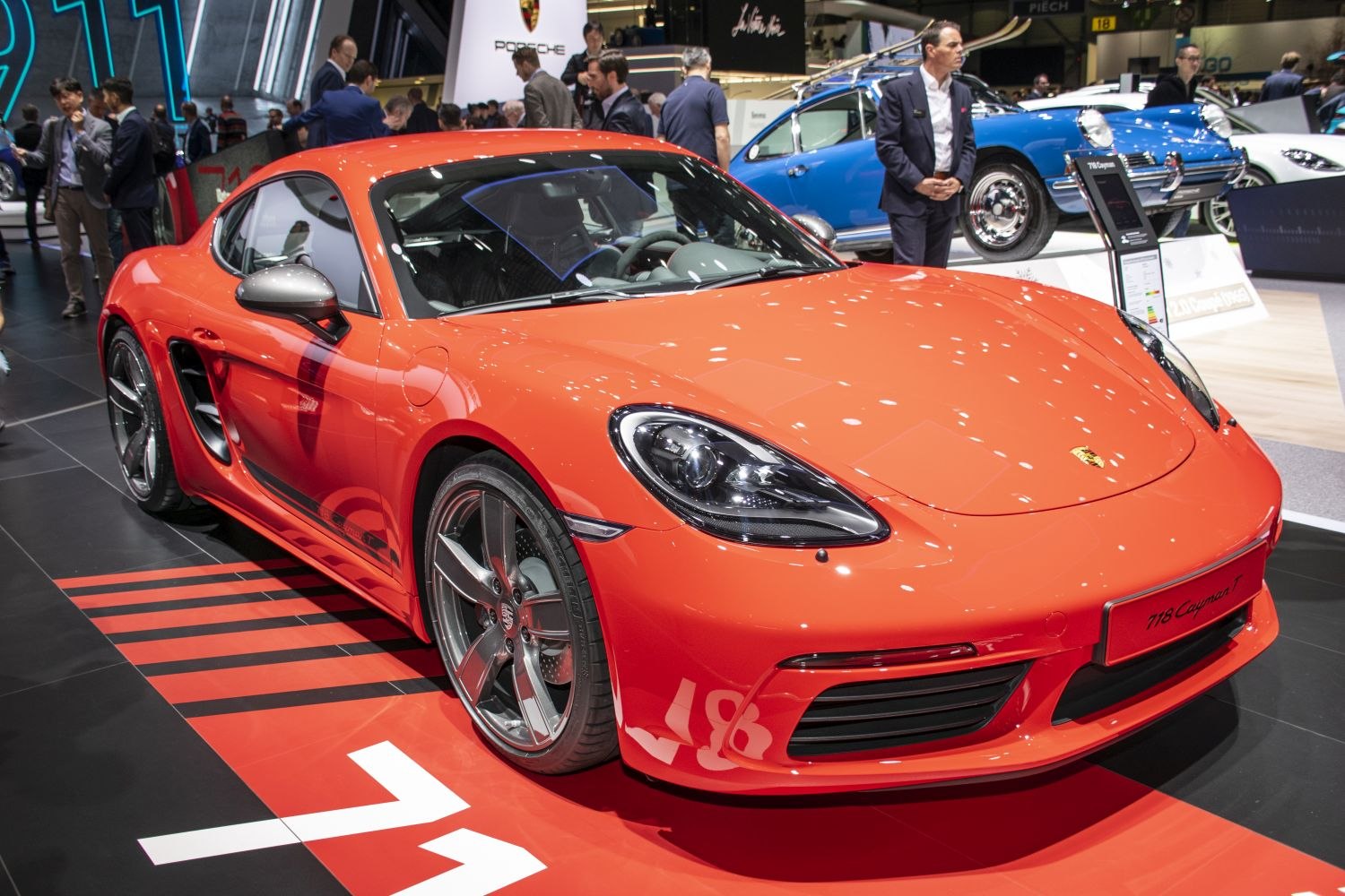 Red sports coupe with aggressive front design and aerodynamic features