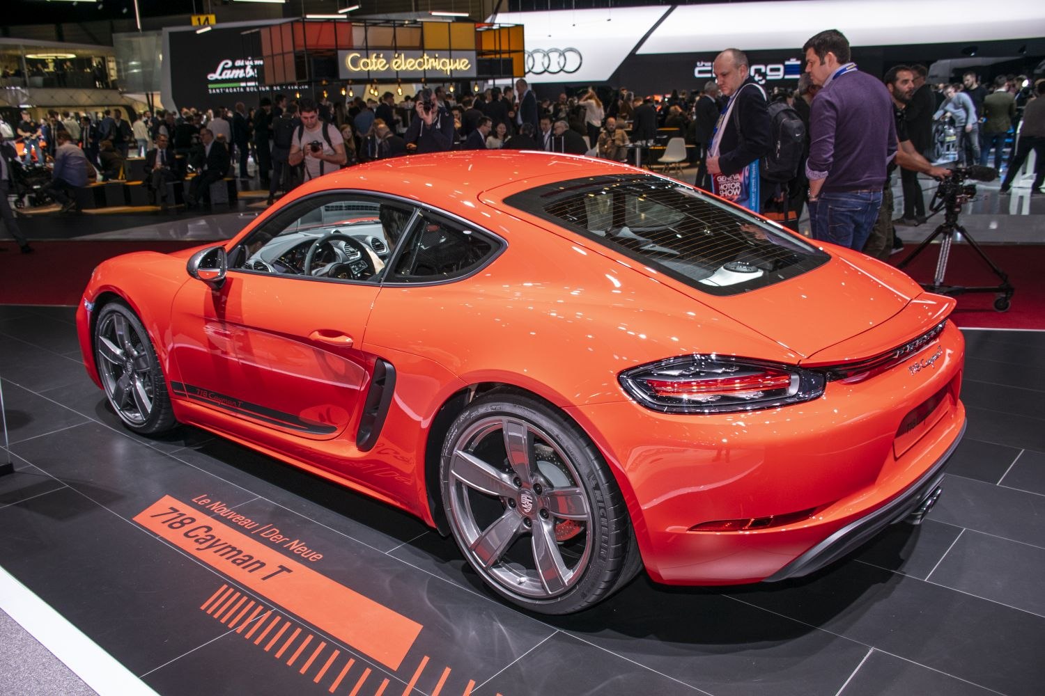 Sports coupe with rear spoiler and alloy wheels