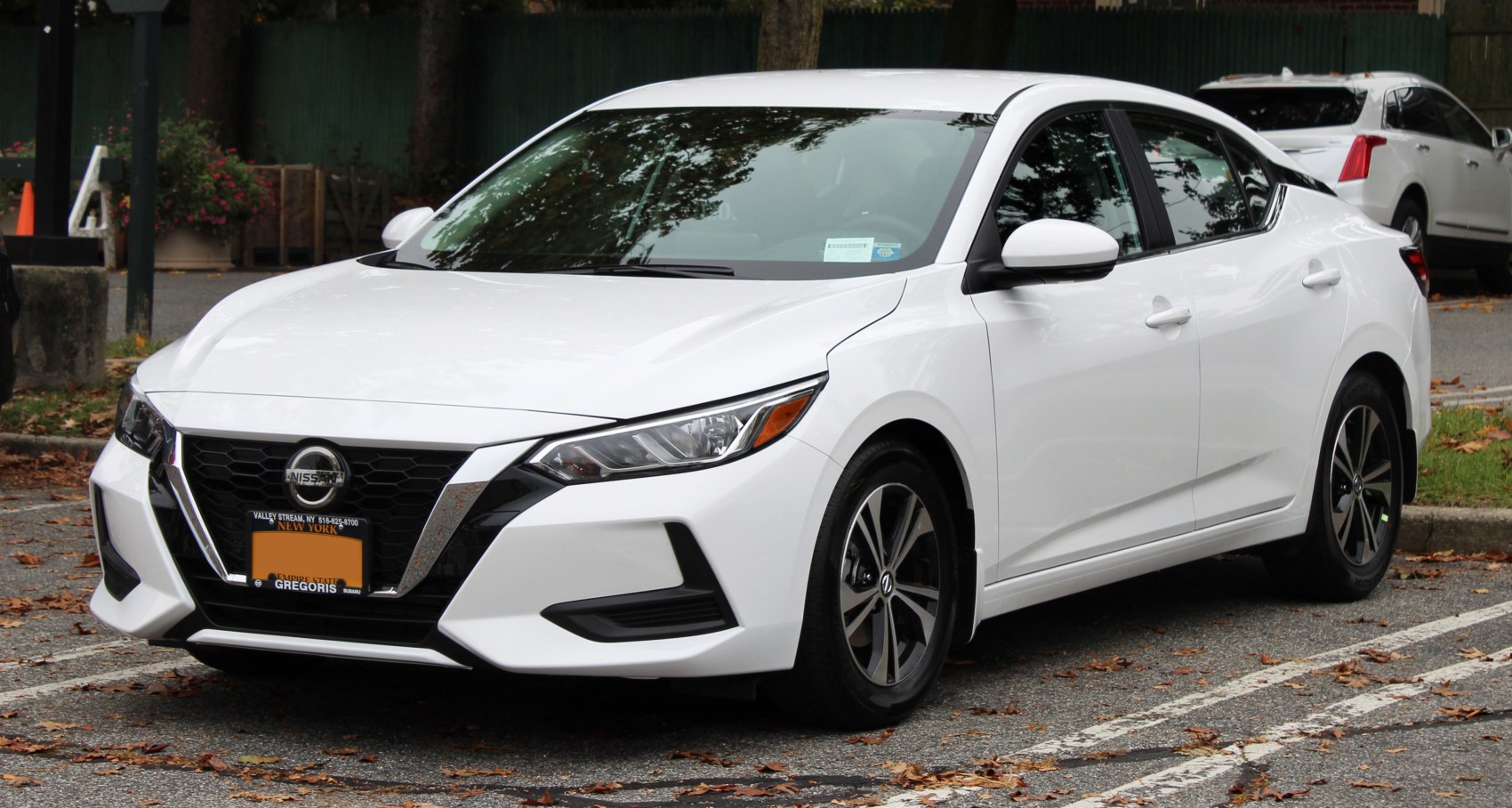 Front view showing grille and sharp headlights