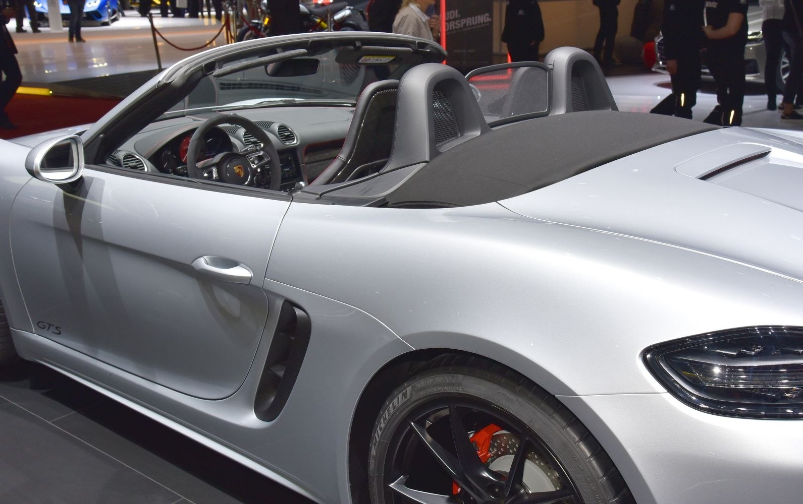 Convertible side and interior view with aerodynamic design and open roof