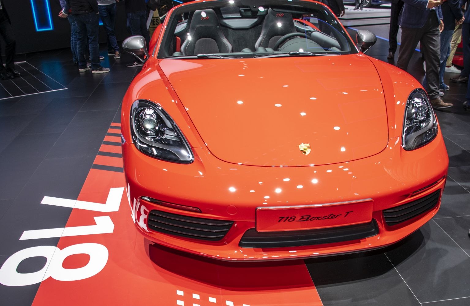Front view with headlights and sport racing seats.