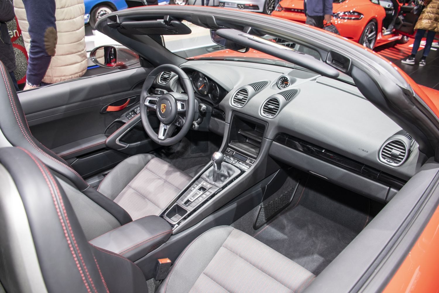 Sporty convertible interior with manual gear shift and luxury seats