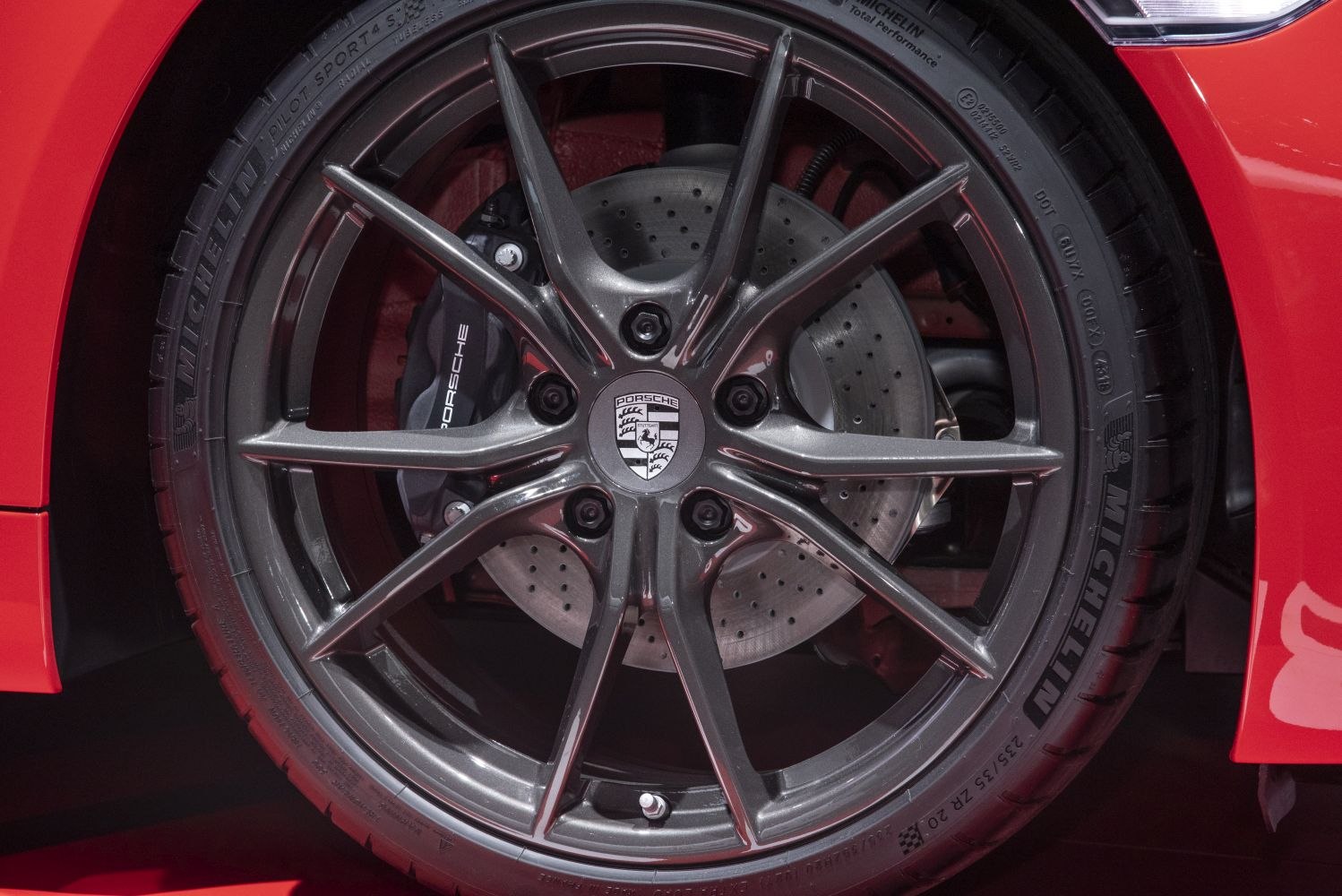 Close-up of alloy wheel and ventilated brake disc with Michelin tire