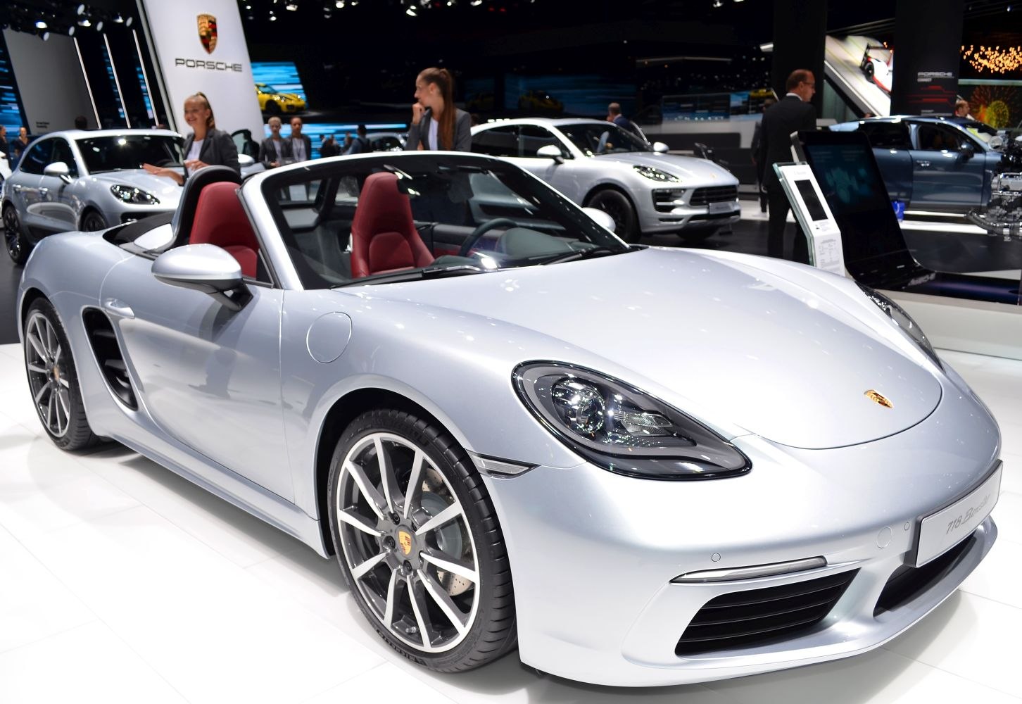Silver convertible with red leather interior and sporty alloy wheels