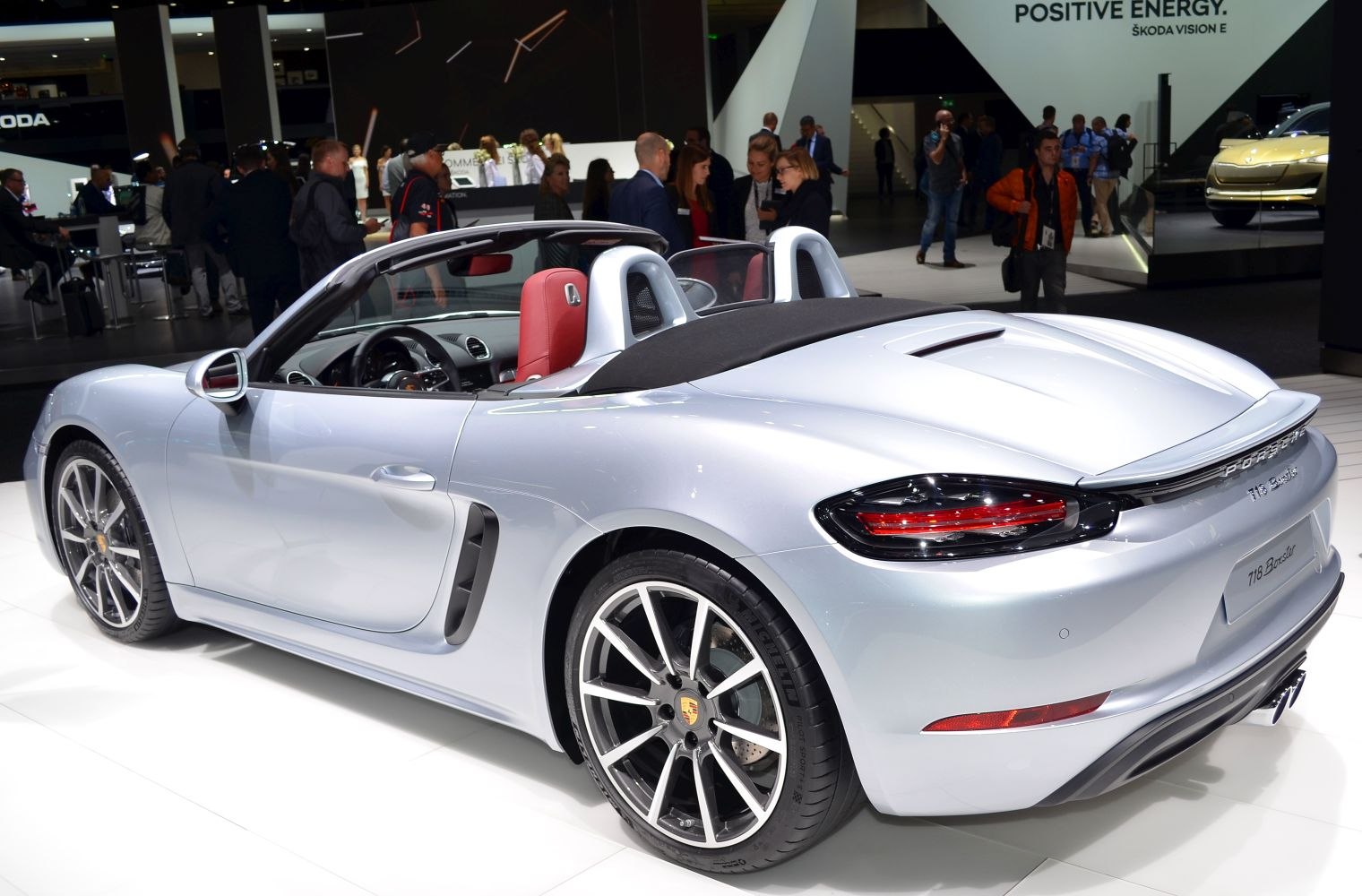 Convertible sports car rear and side design with alloy wheels and air intakes