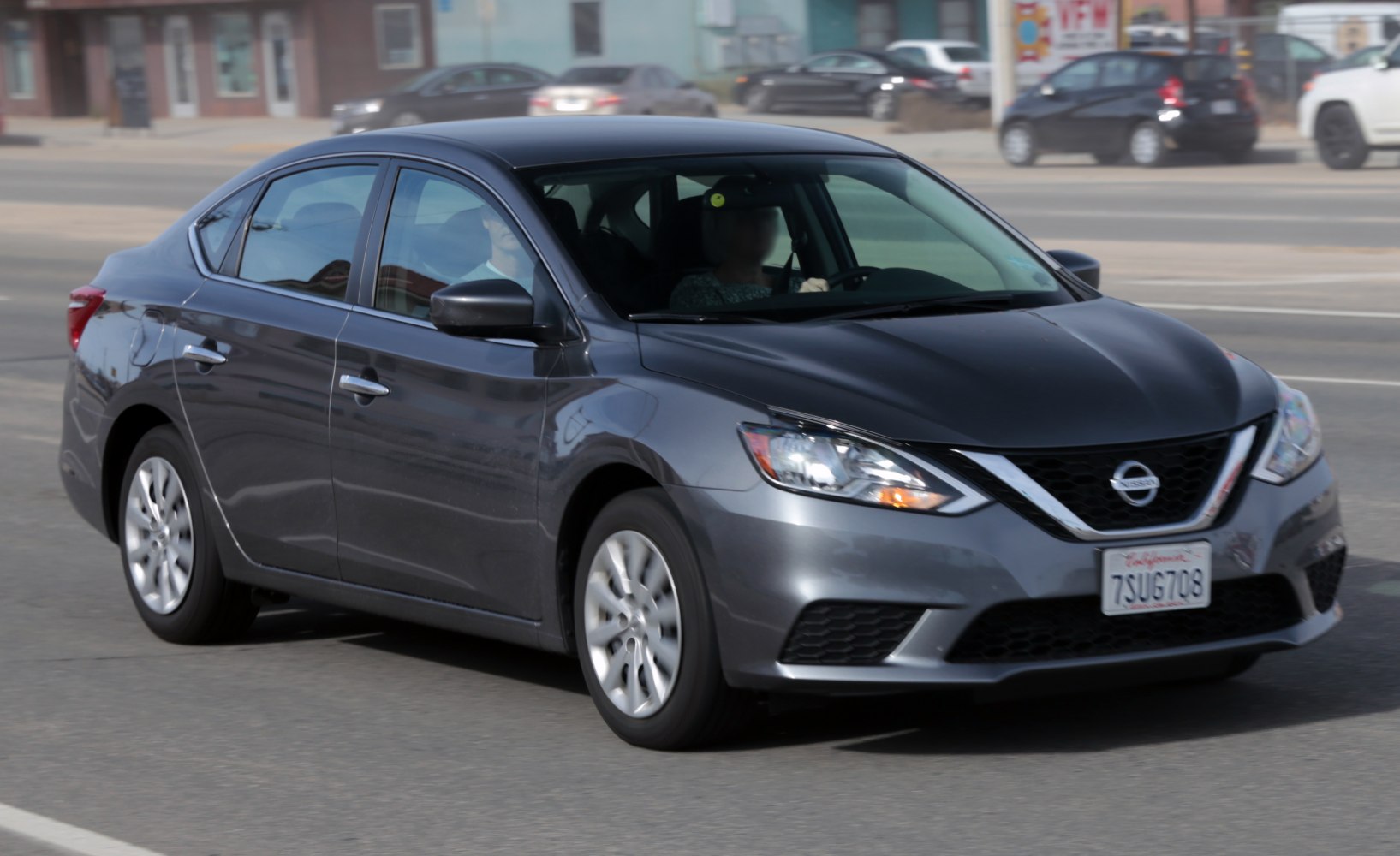 Front side view with headlights and grille design