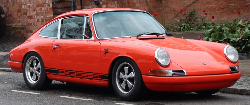 Vintage coupe with round headlights and iconic retro design