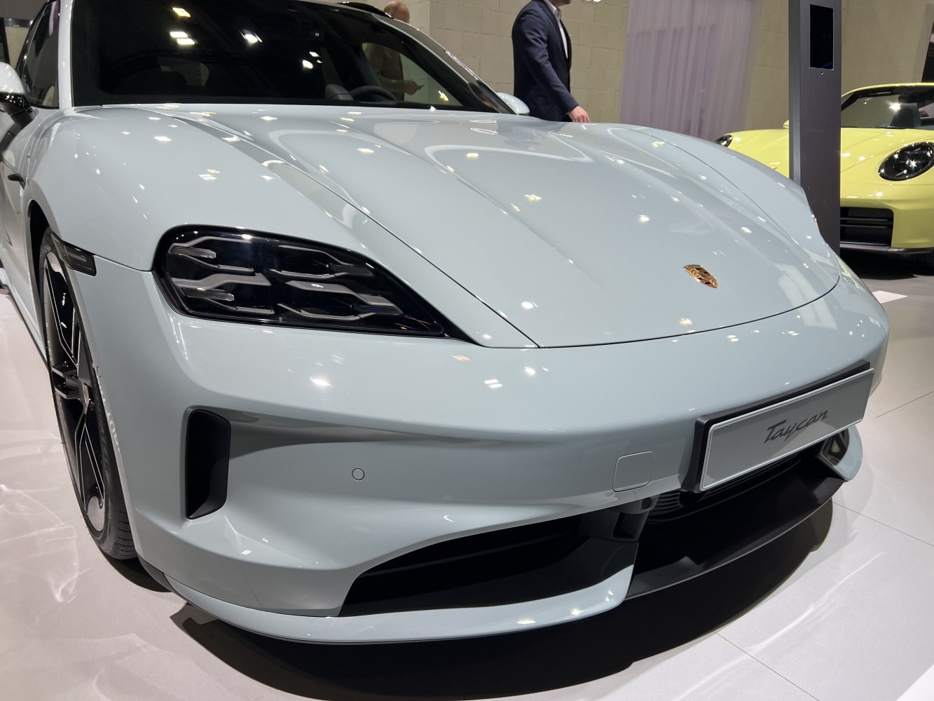 Close-up of sleek headlights and sporty front bumper