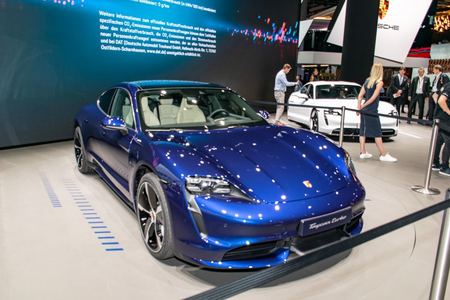 Front view of electric sports sedan with LED headlights and aerodynamic design