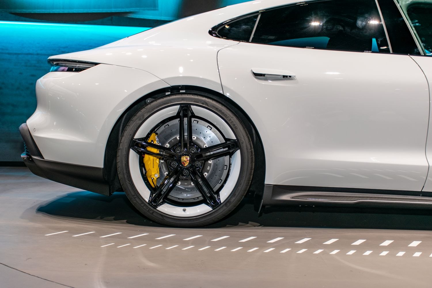 Rear wheel and side profile with brake caliper and door handle