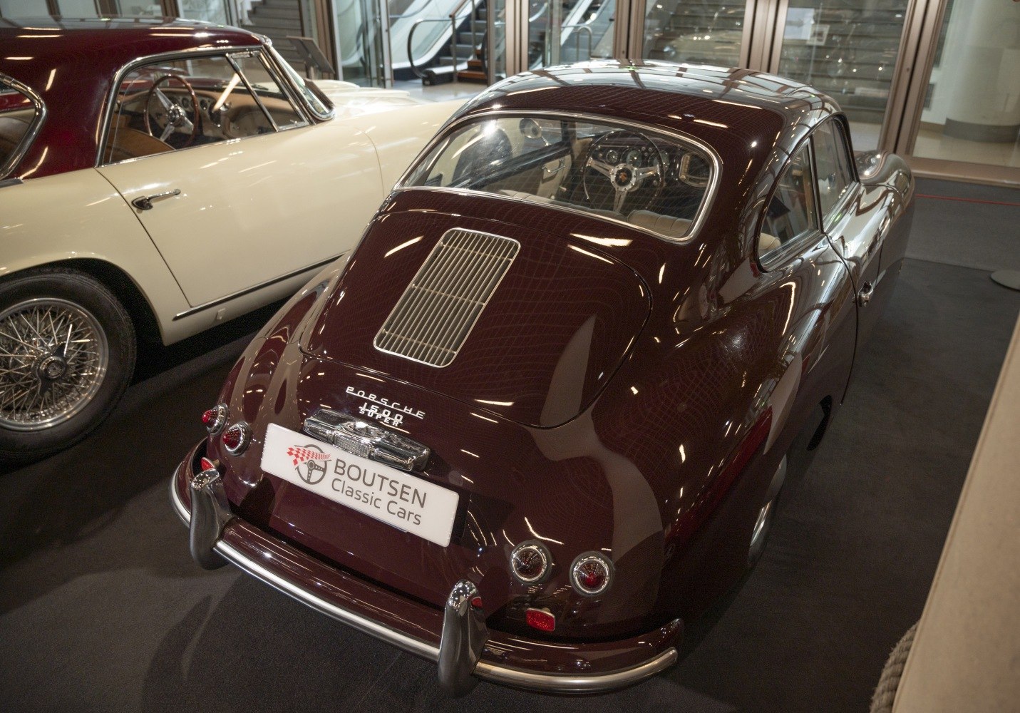 Vintage coupe rear with engine grill and round tail lights