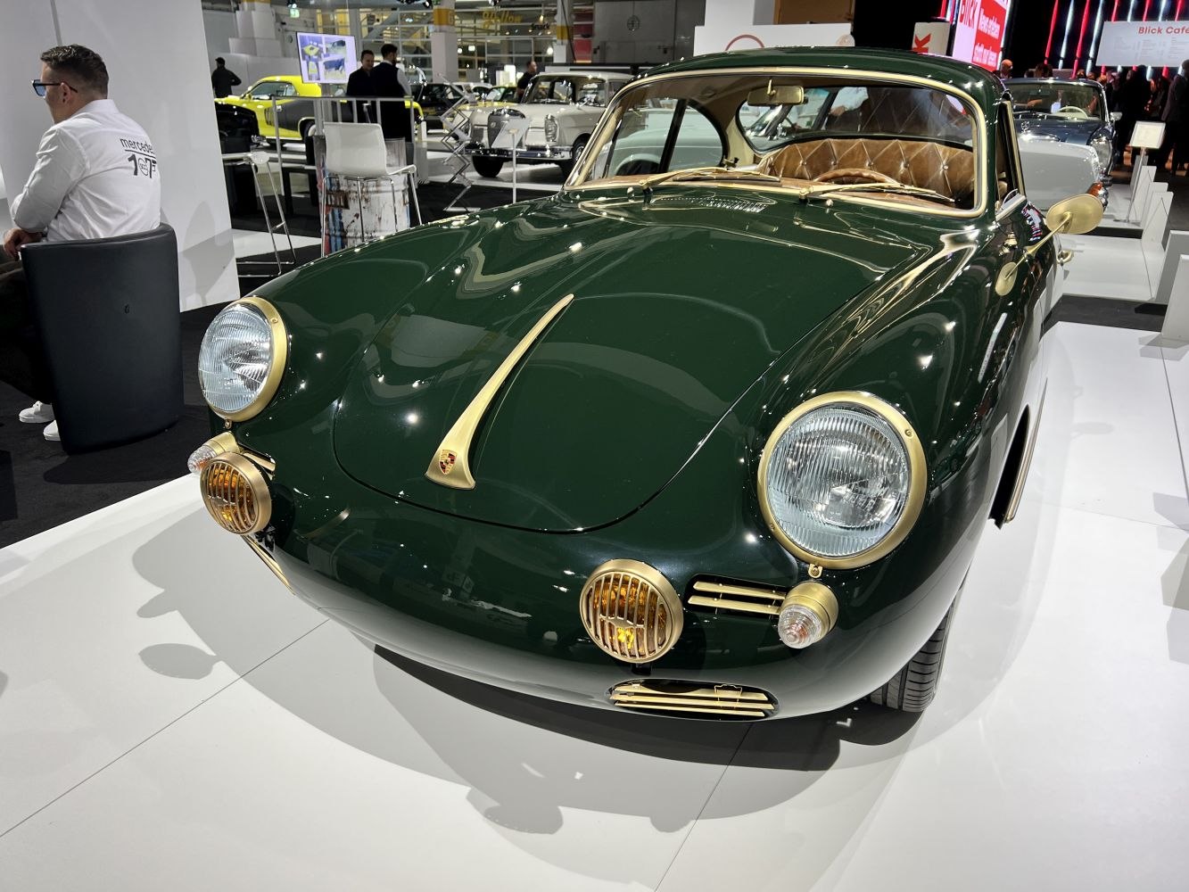 Vintage sports coupe front with round headlights and fog lamps