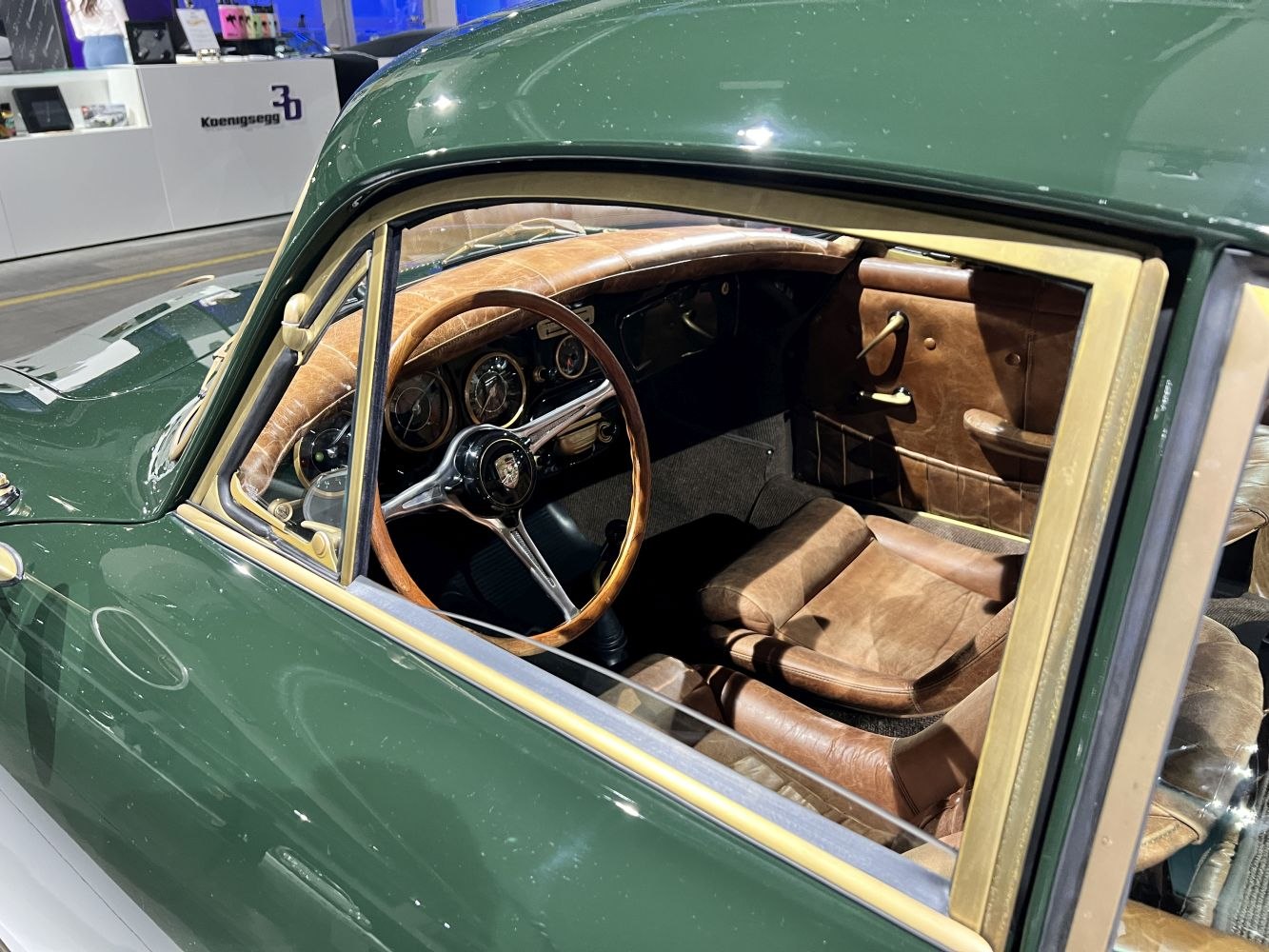 Classic leather interior and wooden steering wheel close-up