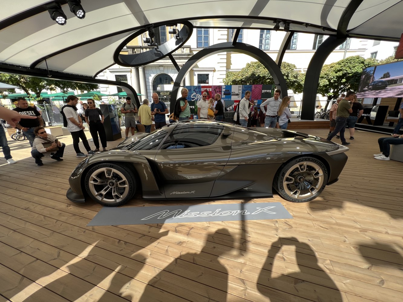 Sleek side profile and futuristic wheels of a concept sports car