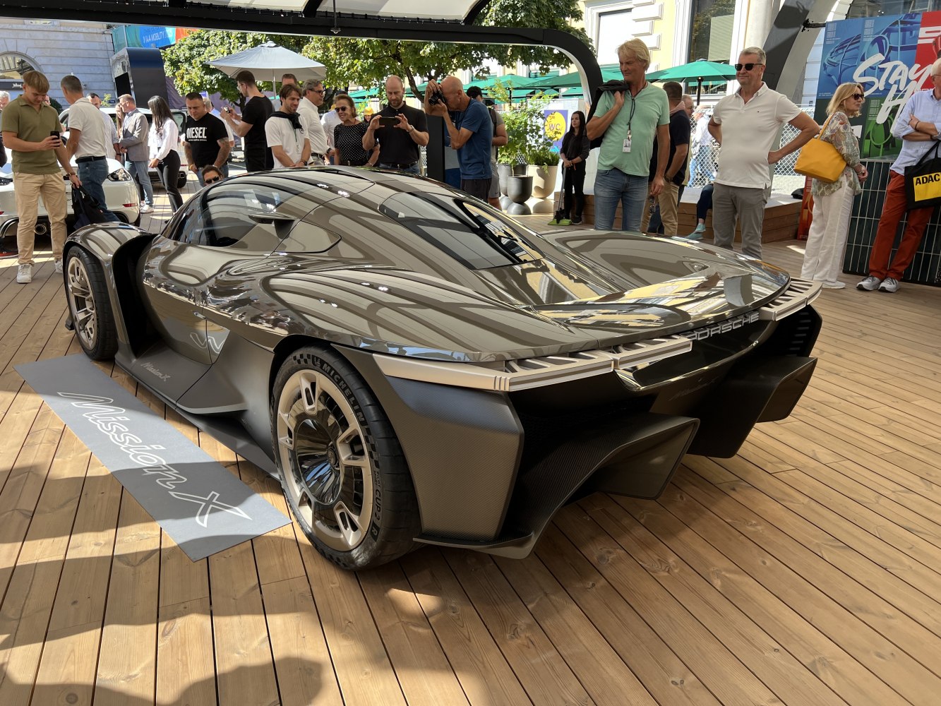 Futuristic aerodynamic rear with integrated diffuser and sleek racing wheels