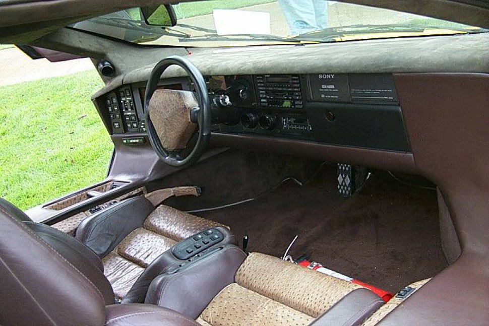 Vintage car interior with unique dashboard and leather seats