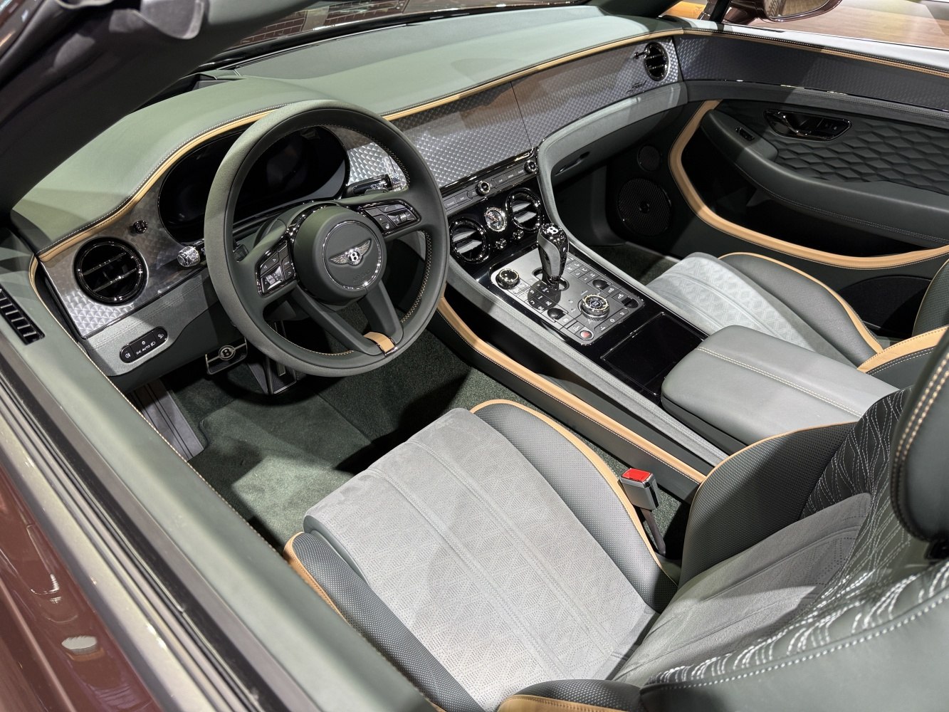 Luxury interior with advanced dashboard, leather seats, and elegant trim