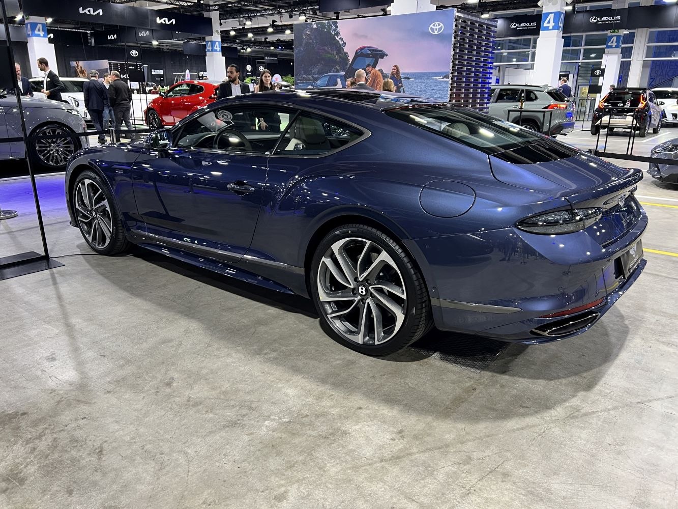 Luxury coupe rear side view with sporty alloy wheels