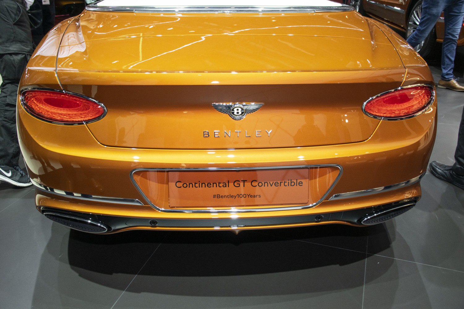 Rear taillights and dual exhausts of a luxury convertible