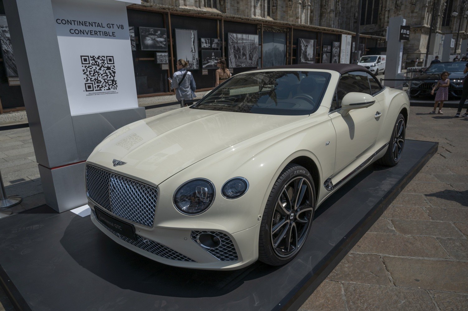 Luxury convertible with prominent front grille and sleek roof