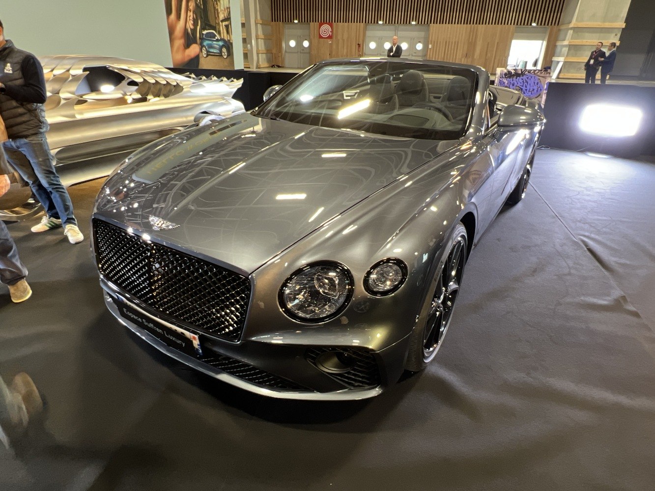 Luxury convertible with mesh grille and round headlights