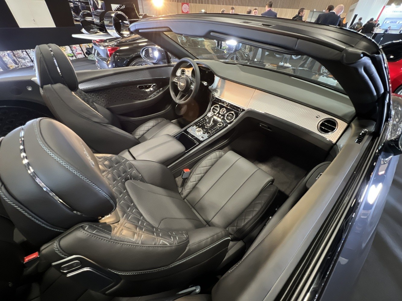 Luxury convertible interior with premium leather seats and advanced dashboard