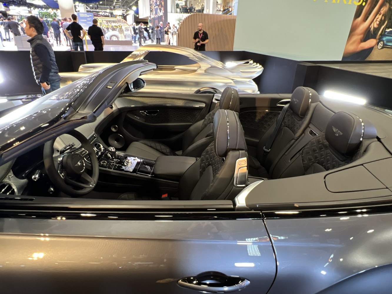 Luxury convertible showing leather quilted seats and intricate interior controls
