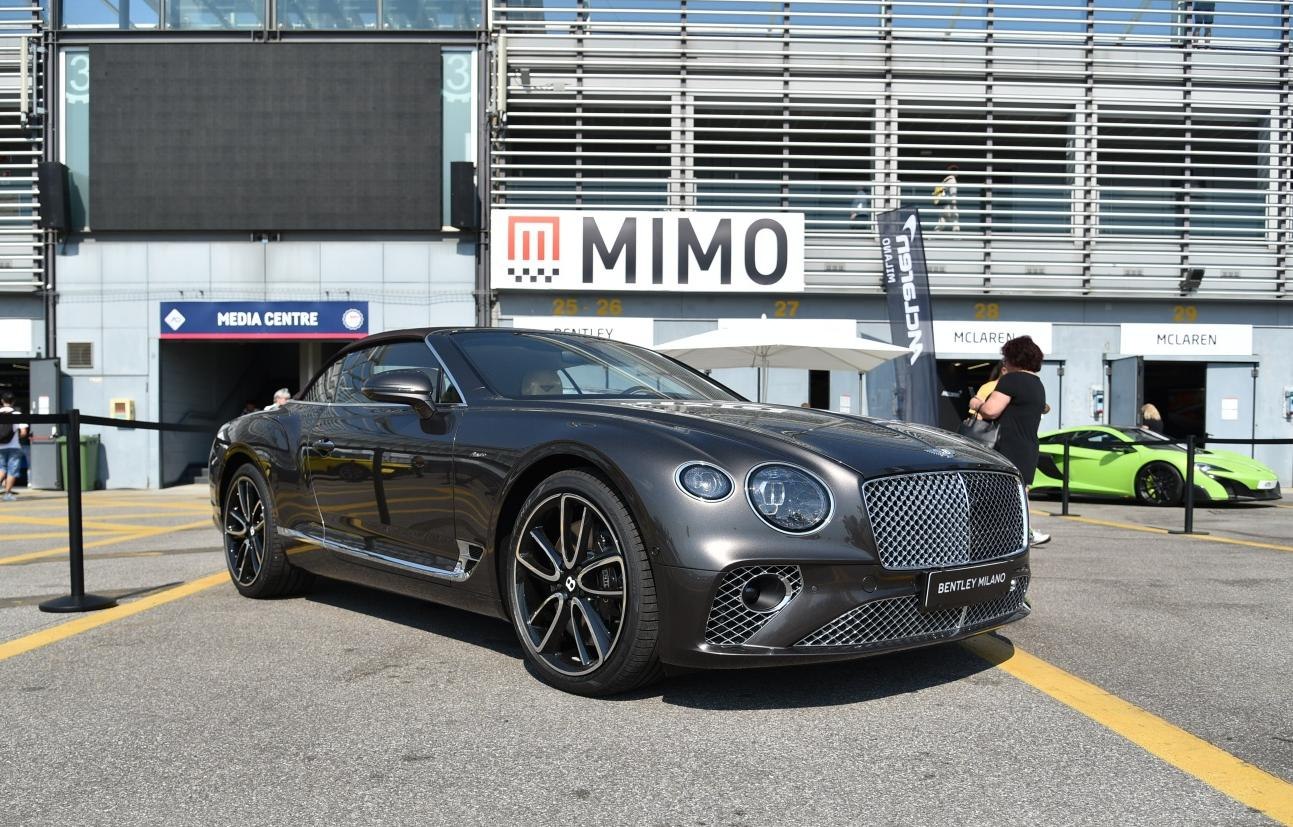 Front and side view of luxury convertible with distinctive grille and alloy wheels