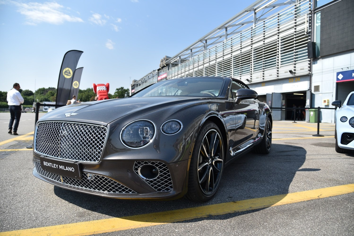 Front and side view of luxury convertible with signature grille and alloy wheels
