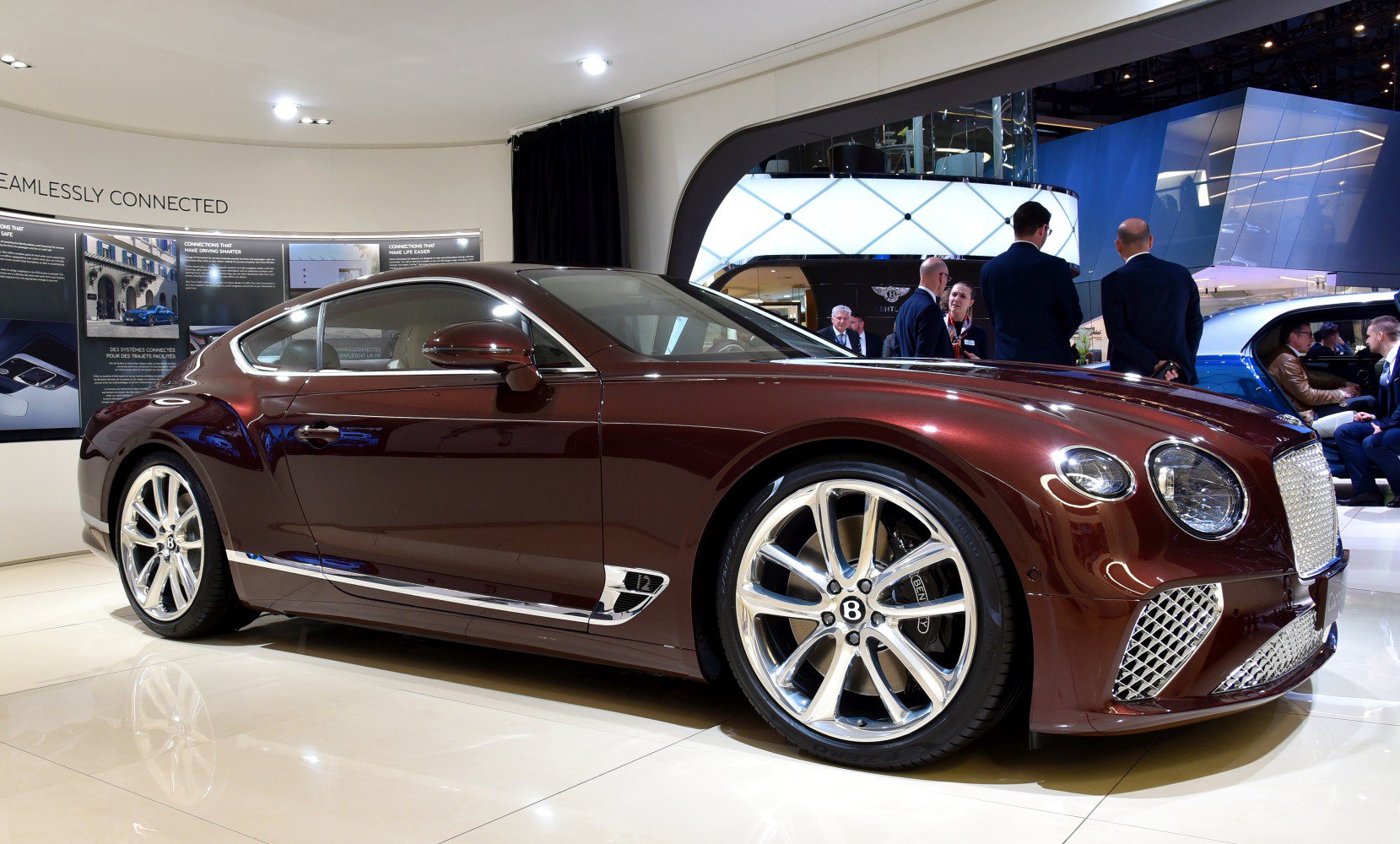 Luxury coupe with polished alloy wheels and chrome side trim