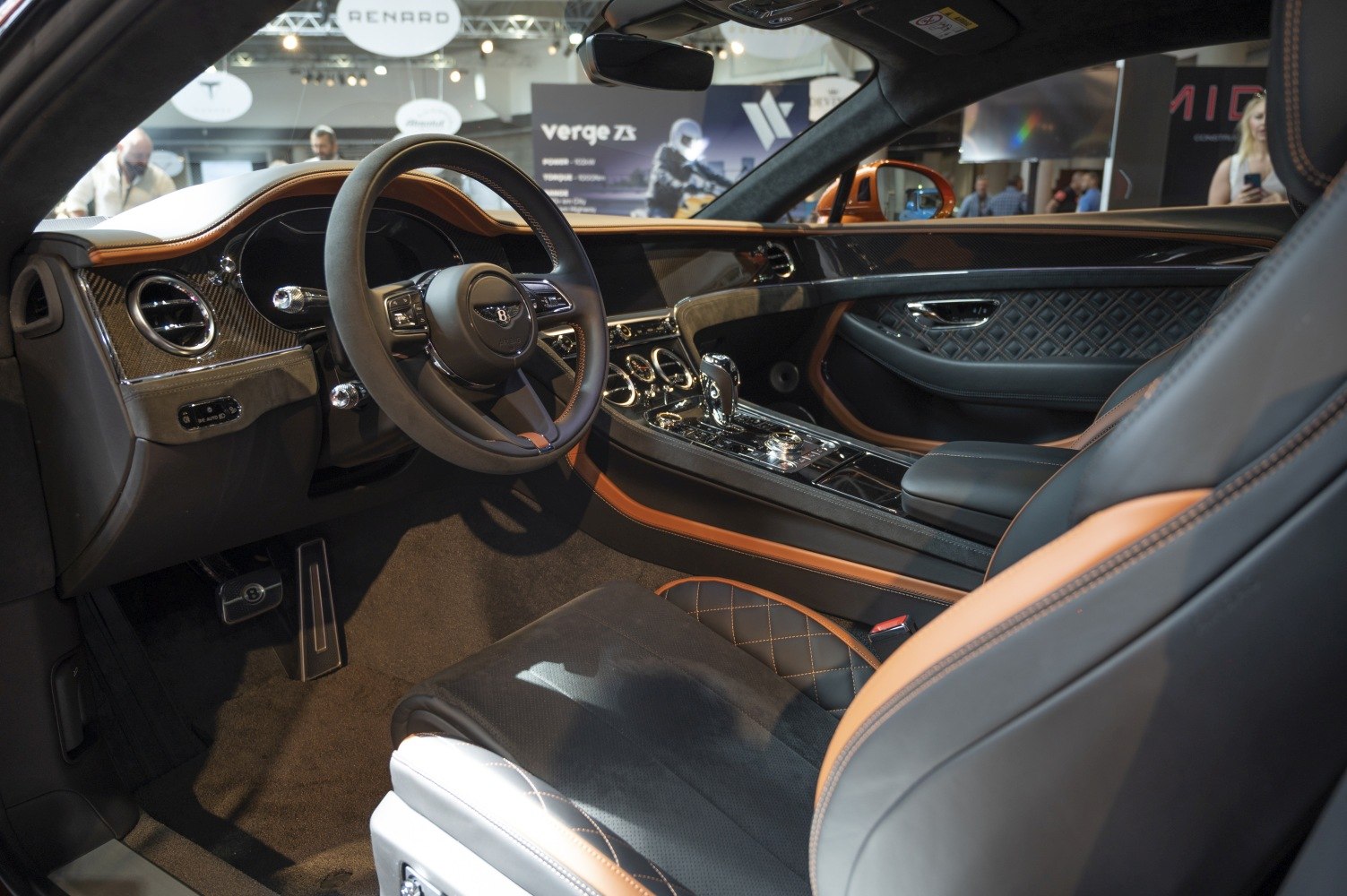 Luxury car interior with leather seats and advanced dashboard controls