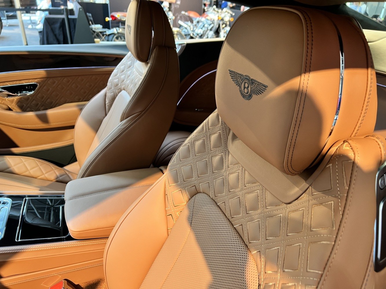 Luxury quilted leather seats with embossed Bentley emblem