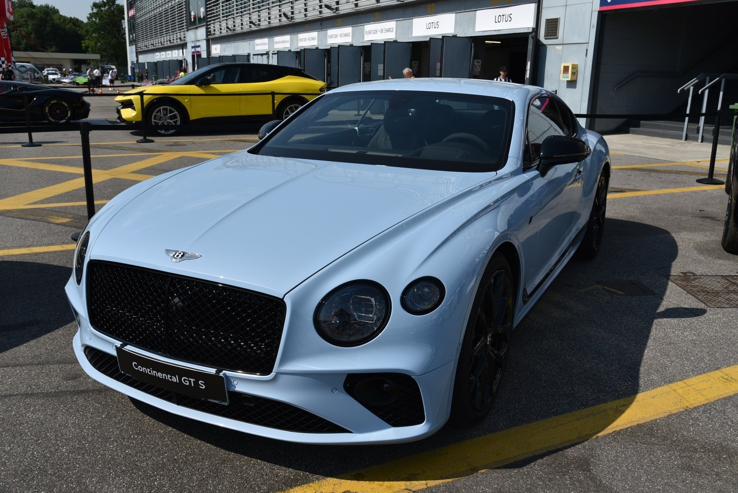 Front exterior with distinctive grille and dual round headlights