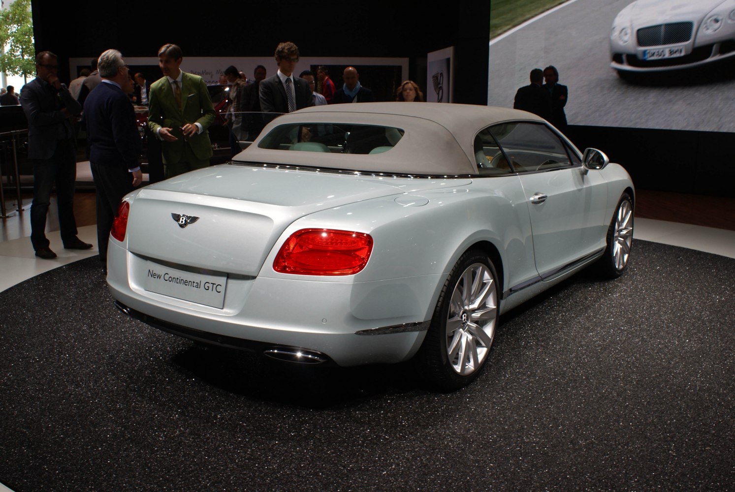 Luxury soft top convertible rear with red taillights and alloy wheels