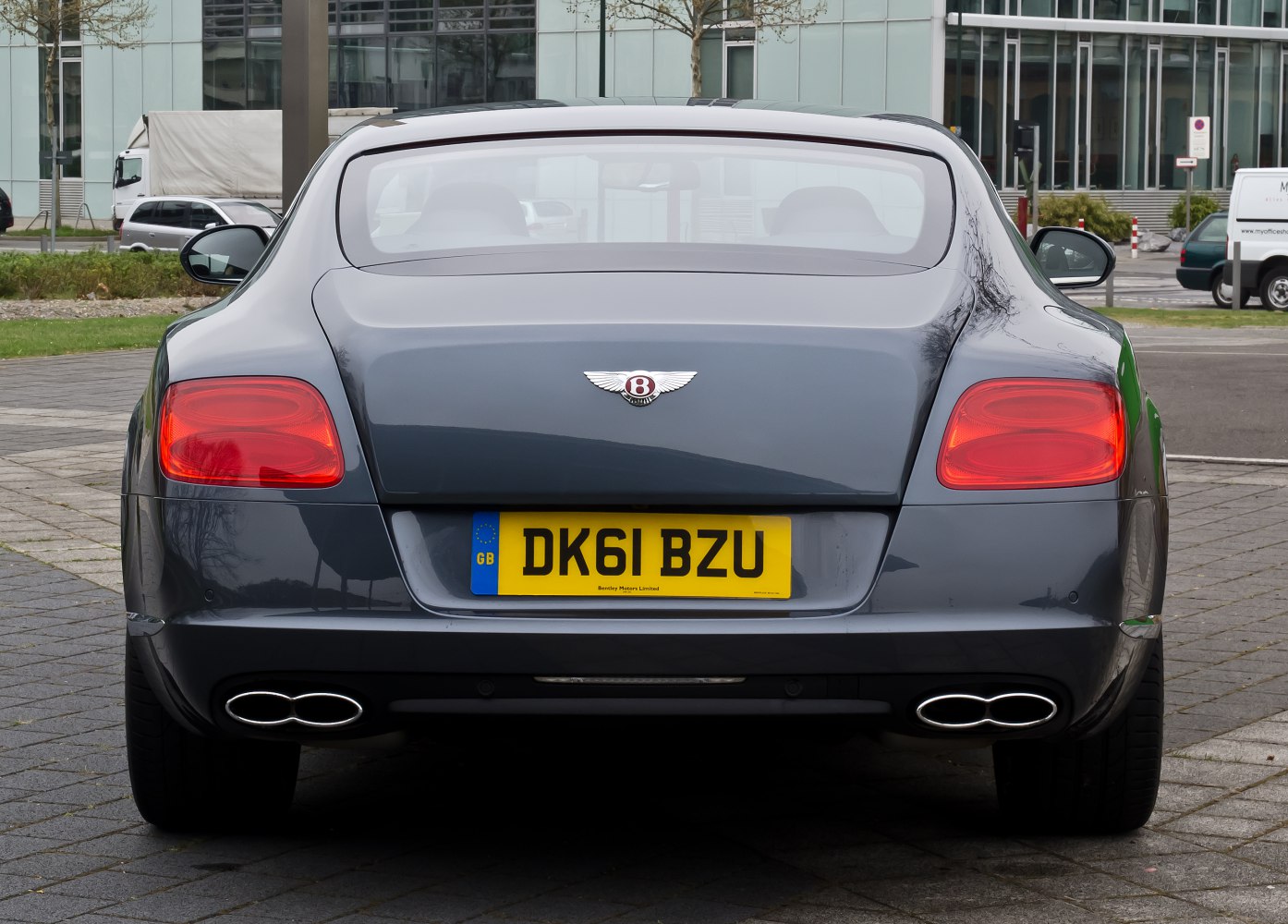 Rear view with tail lights and dual exhaust tips