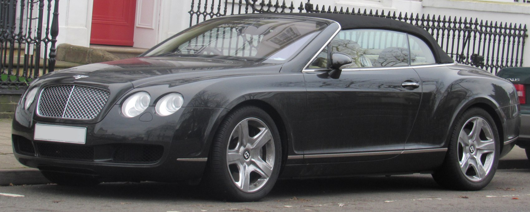 Luxury convertible with front grille and soft top