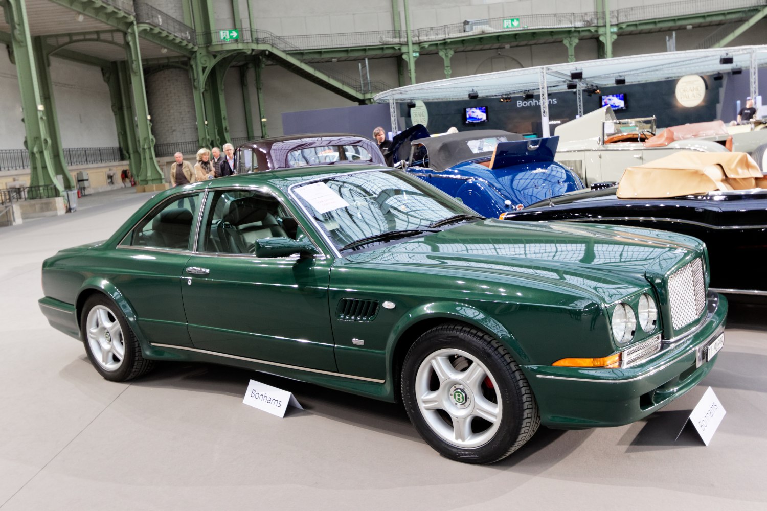Classic luxury coupe with large front grille and unique alloy wheels