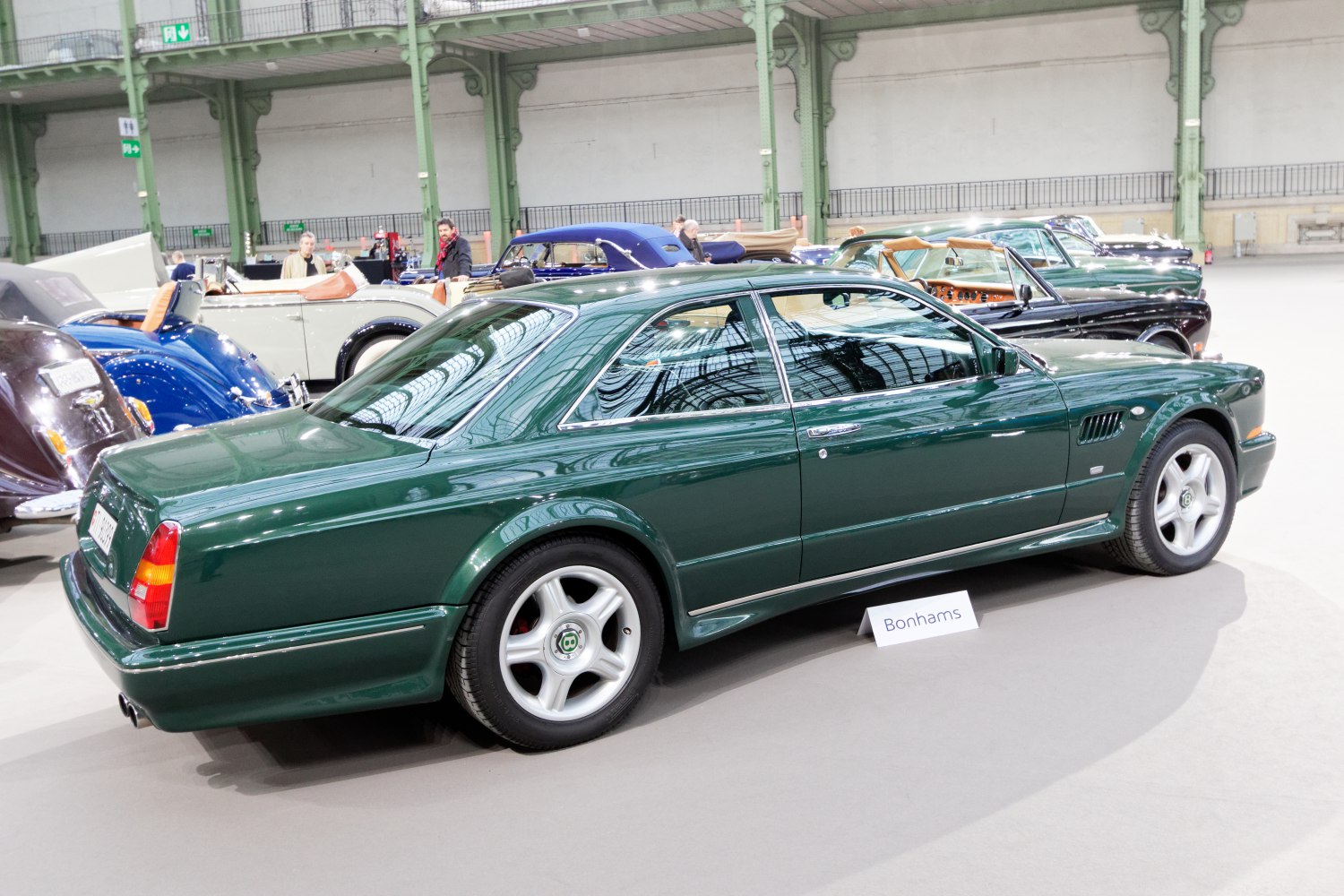 Two-door luxury coupe with smooth body lines and five-spoke alloy wheels