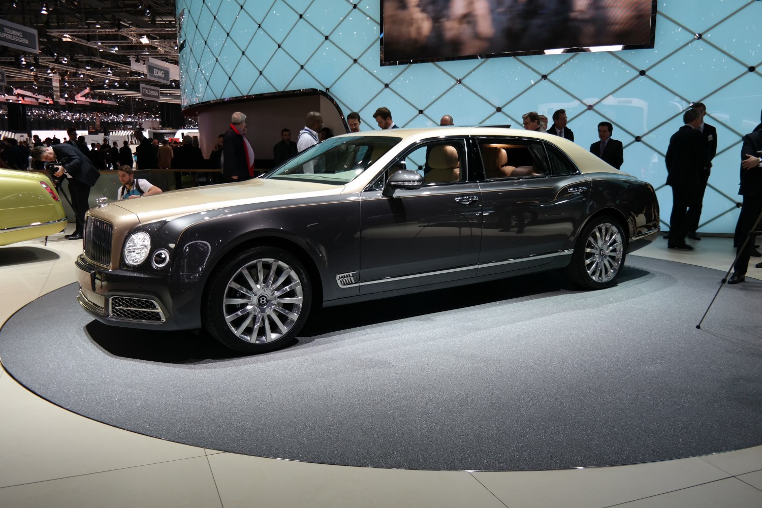 Luxury extended wheelbase sedan with dual-tone paint and alloy wheels
