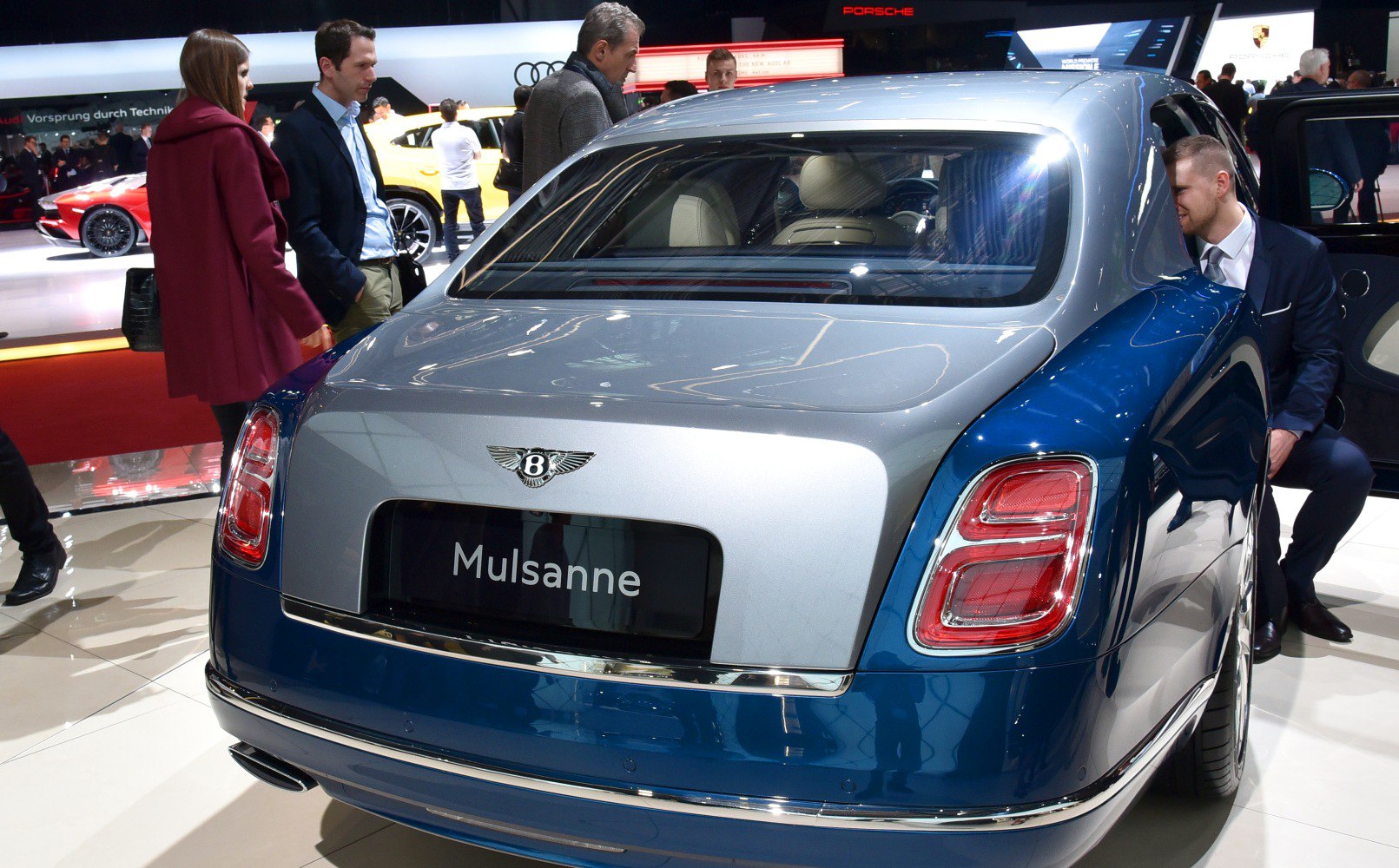 Rear view with distinctive taillights and two-tone trunk design