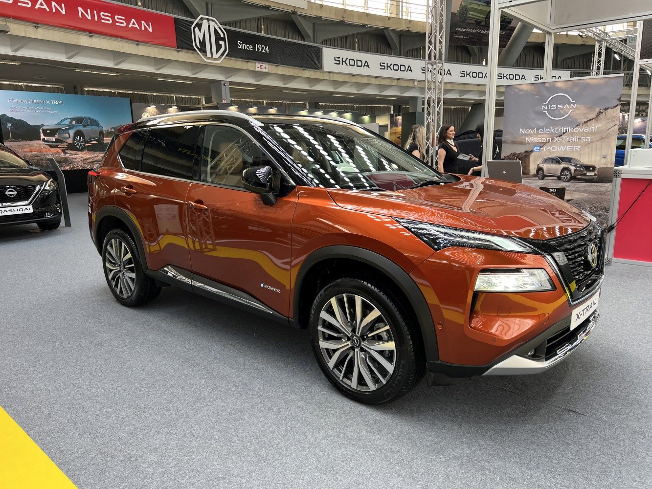 Front side view of SUV with sleek LED headlights and alloy wheels
