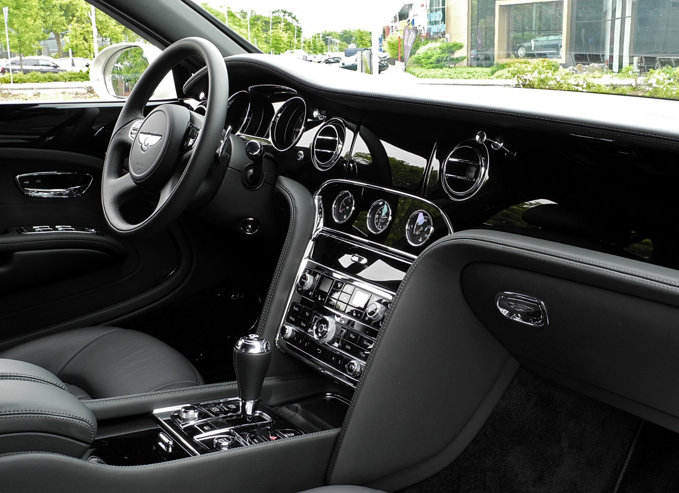 Premium luxury interior with dashboard, clocks, and gear selector