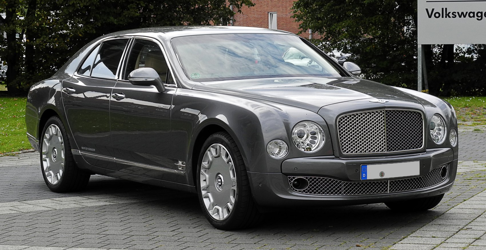 Mesh front grille and dual-round headlights on luxury sedan