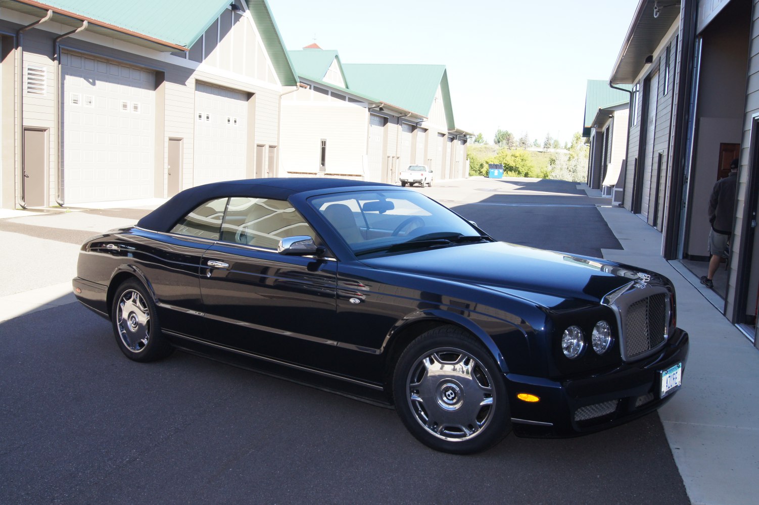 Luxury convertible with soft fabric roof and chrome wheels